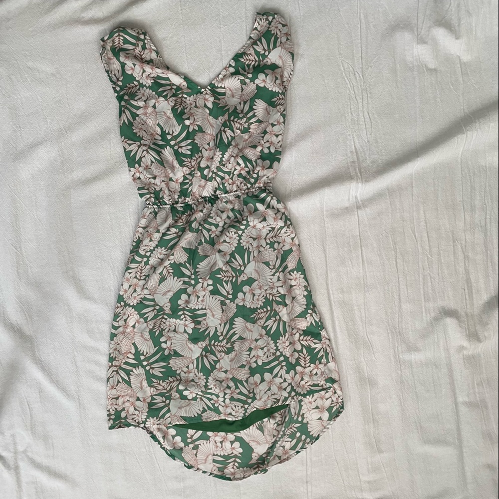Fun green and white dress with cut-out back